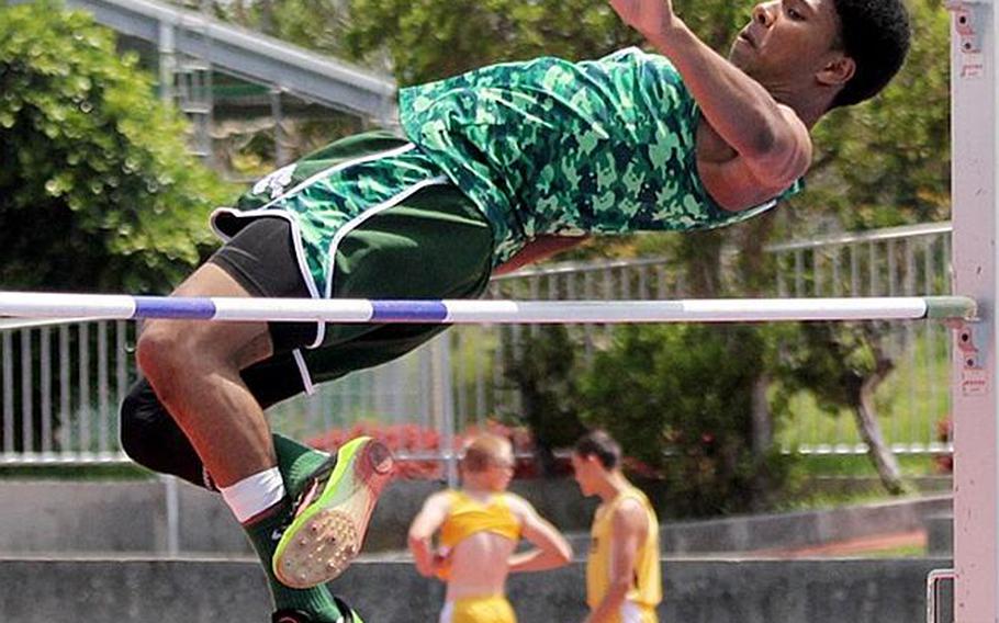 Kubasaki junior Johann Wright, shown jumping in the Okinawa district finals, has the Pacific's highest height this season at 1.82 meters, or 5 feet, 11 1/2 inches.