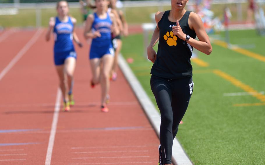 Patch's Julia Lockridge leads the pack on her way to winning the girls 1600-meter run in a new DODDS-Europe record of 5 minutes, 10.26 seconds at the DODDS-Europe track and field championships in Kaiserslautern, Germany, Friday, May 22, 2015. Lockridge, who also won the 800-meter race at the championships has been named the Stars and Stripes girls Athlete of the Year for track and field.