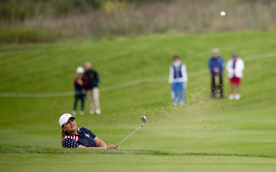 Team USA's Lizette Salas chips out of a bunker Sunday, Sept. 20, 2015 during the Solheim Cup, in St. Leon-Rot, Germany. Despite her opponent taking an early lead, Salas won the singles match, 3 and 1.