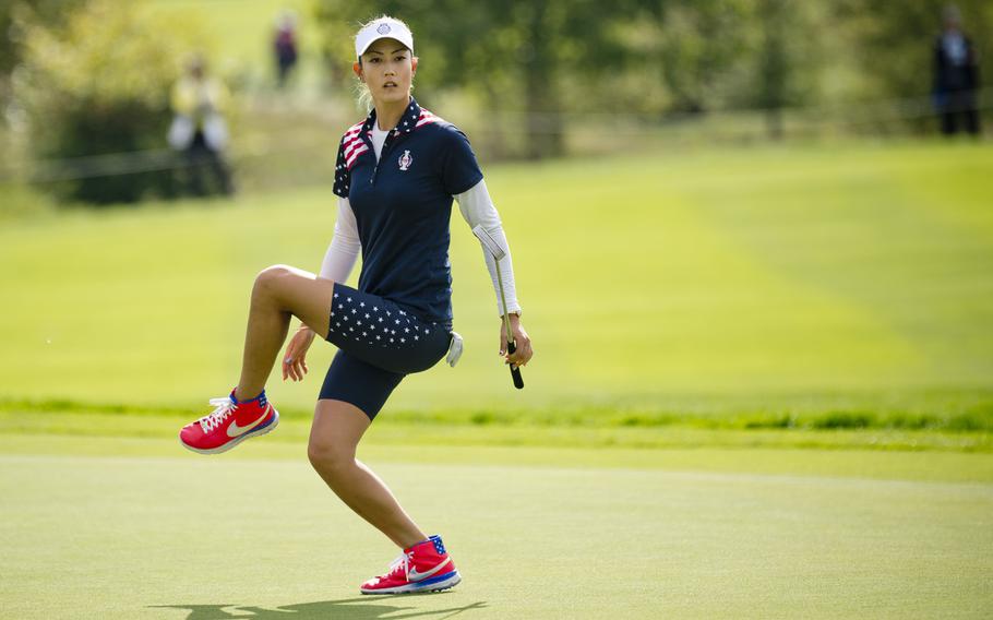Team USA's Michelle Wie watches her putt during the Solheim Cup in St. Leon-Rot, Germany, Sunday, Sept. 20, 2015. Wie secured a 6 and 4 victory over her opponent during the singles match.