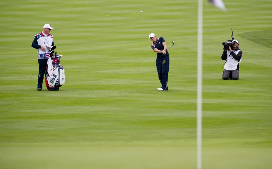 Team USA's Stacy Lewis takes a shot from the fairway during the Solheim Cup Sunday, Sept. 20, 2015, in St. Leon-Rot, Germany. Despite Lewis losing the singles match, Team USA scored enough overall points to win the cup for the first time since 2009.
