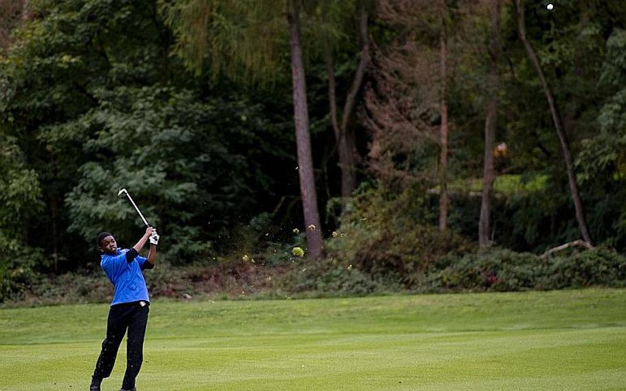 Bitburg's Javian Rouse takes an approach shot during the DODDS-Europe golf championship at Rheinblick golf course in Wiesbaden, Germany on Wednesday, Oct. 7, 2015. Rouse, a freshman, was happy to be paired with fellow freshman and long-time friend Trey Bowles. 