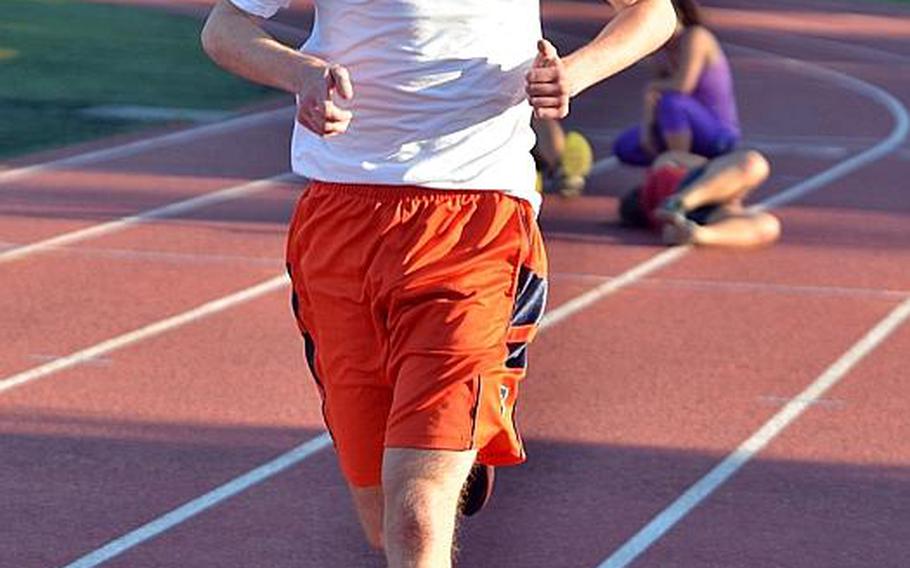 Yokota senior Daniel Galvin goes through his practice paces two days before his final regular-season cross country meet at Tama Hills Recreation Center.