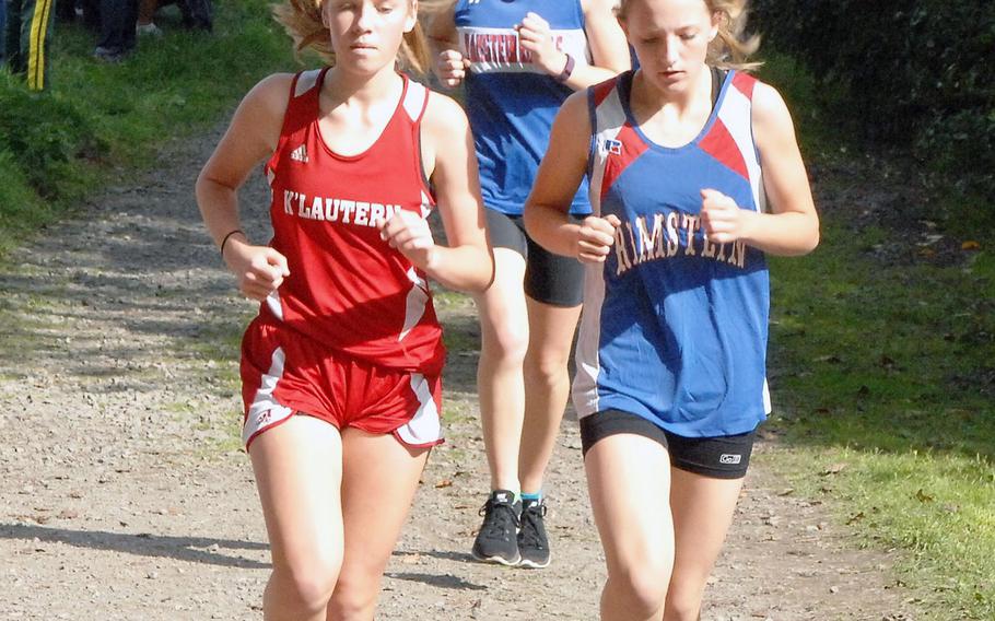 Girls cross country competitors round a corner in a six-school race Saturday, Sept. 26, 2015, at Ramstein-Miesenbach, Germany. Wiesbaden won the girls race ahead of host Ramstein. The DODDS-Europe cross country championships take place at Baumholder on Saturday.