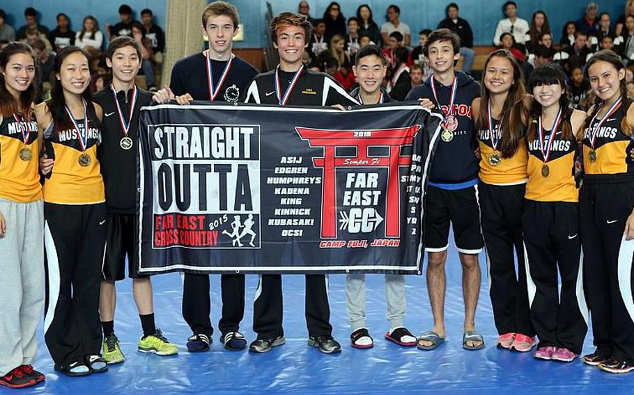 Back-to-back happiness for American School In Japan's cross country team, which repeated its Far East meet Division I overall school banner.