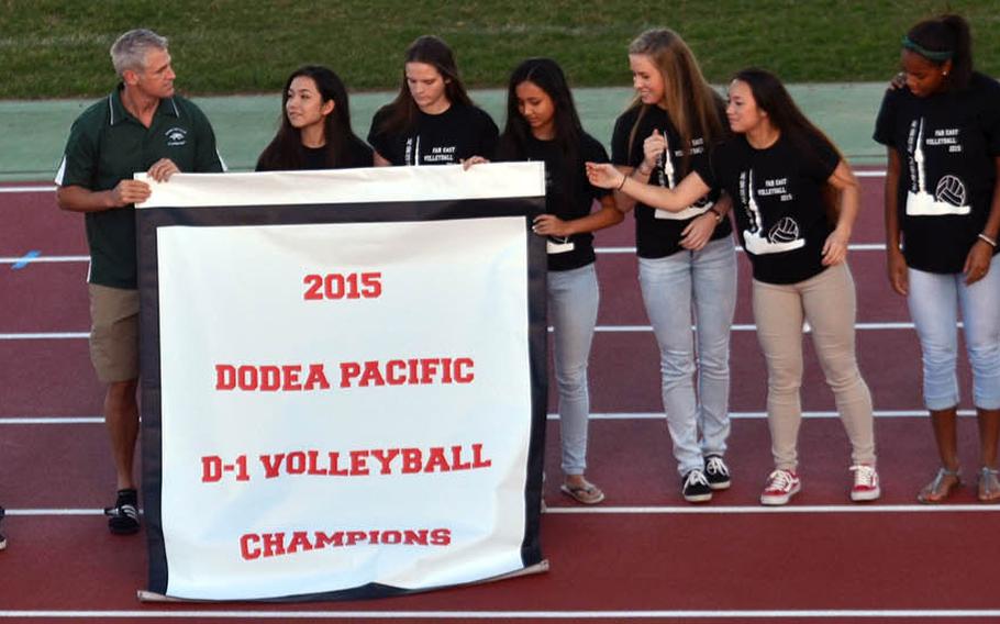 Halftime saw Kubasaki champions in other sports displaying their title wares, including Dragons volleyball, which repeated its Division I championship of a year ago.