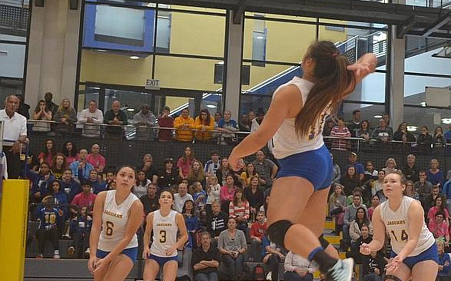 Leilani Wojtal of Sigonella  spikes the ball during the DODDS-Europe Division III volleyball championship match against Alconbury on Saturday, Nov. 7, 2015 at Ramstein Air Base, Germany.