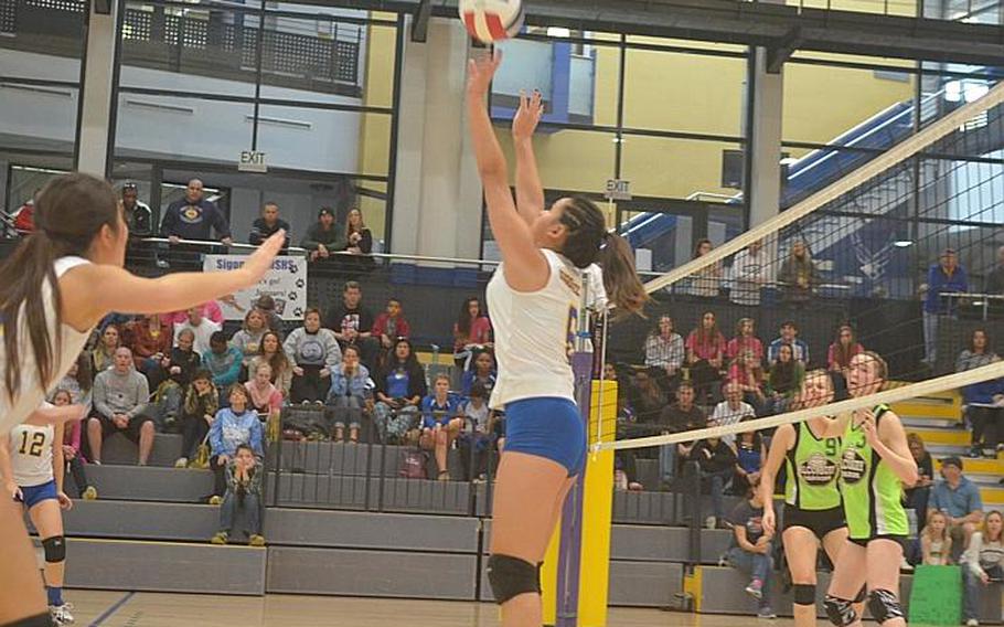 Sigonella sophomore Marika Wojtal sets up a teammate in the DODDS-Europe Division III volleyball final match against Alconbury at Ramstein Air Base, Germany, Saturday, Nov. 7, 2015.