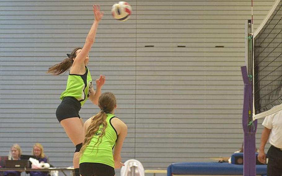 Sam Zitka, an Alconbury senior, hits a spike in the DODDS-Europe Division III volleyball finals against Sigonella at Ramstein Air Base, Germany, Saturday, Nov. 7, 2015.