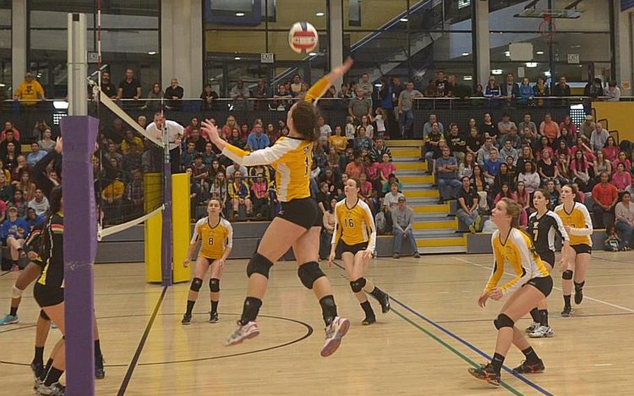 Stuttgart's Julia Smith spikes the ball during the DODDS-Europe Division I volleyball championship match against Vicenza on Saturday, Nov. 7, 2015 at Ramstein Air Base, Germany.