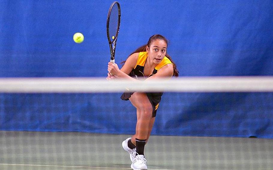 Marissa Encarnacion of Stuttgart watches her ball fly across the net in her 6-0, 6-0 first-round win over Lakenheath's Marisa Peredo in this year's DODDS-Europe championship. She went on to win her second title.