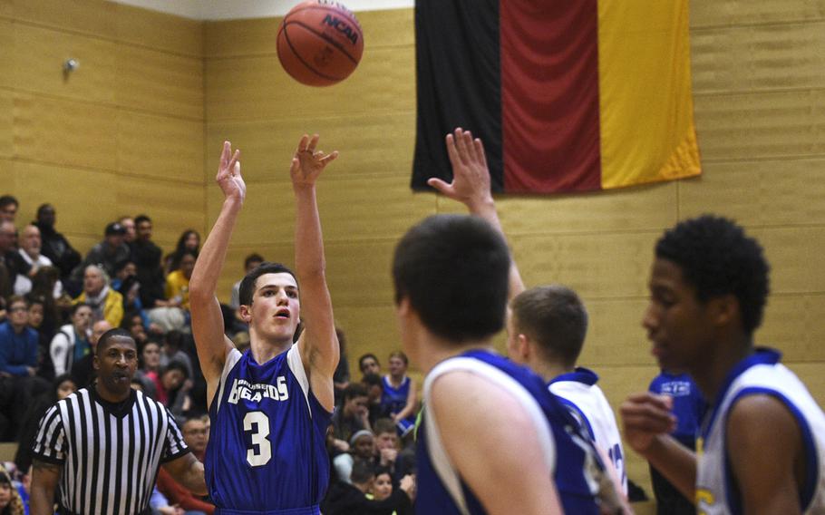 Brussels'  Michael DeFazio shoots a three pointer against Sigonella in the semifinals of last season's DODDS-Europe tournament, Friday, Feb. 20, 2015.