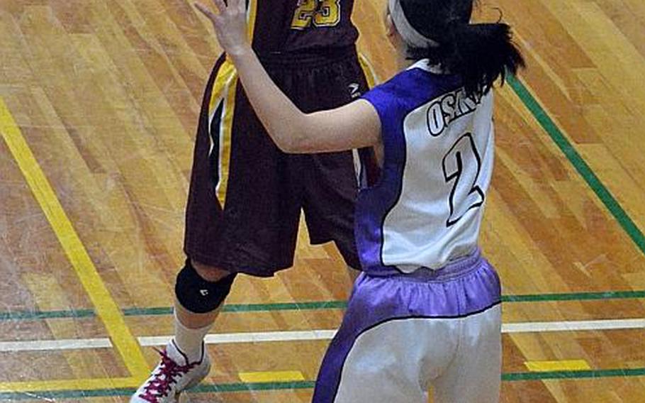 Matthew C. Perry senior guard Naomi Ziola look to pass in the Sabres Invitational Girls Basketball Festival at Osaka, Japan.