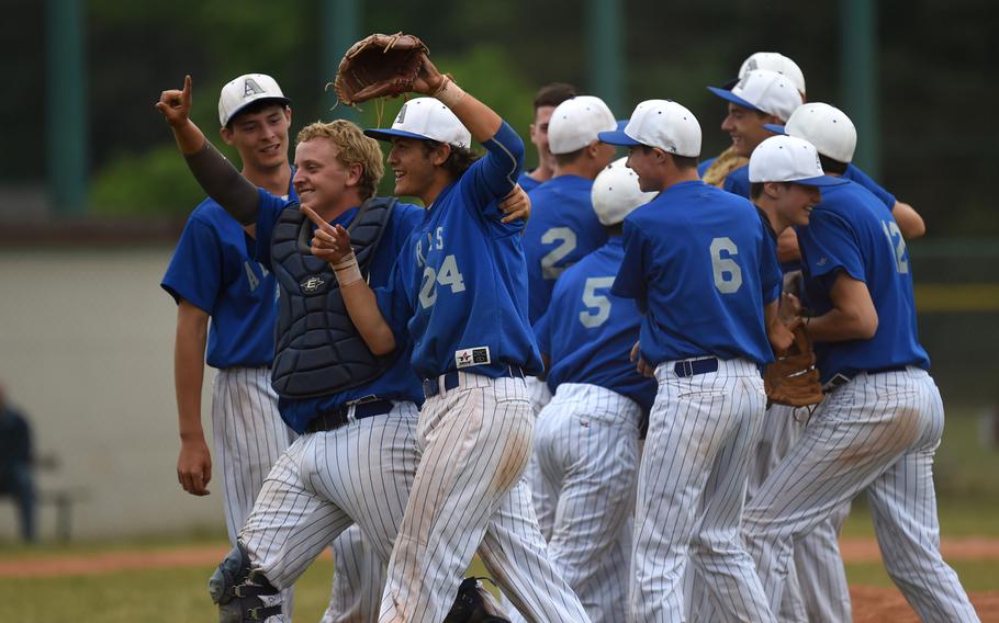 The Rota Admirals celebrate after winning the DODDS-Europe Division II/III baseball title with a 12-5 win over Ansbach, May 23, 2015.
