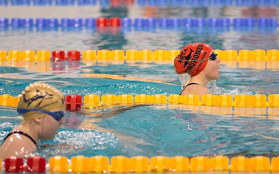 Rota's Meredith Stanton pulls ahead of Kaiserslautern's Lily Pflugradt during the girls' 200-meter individual medley as the second day of the 2016 European Forces Swim League championships kicked off in Eindhoven, Netherlands, Sunday, Feb. 28, 2016. Stanton won that heat with a time of 4:17.29. 