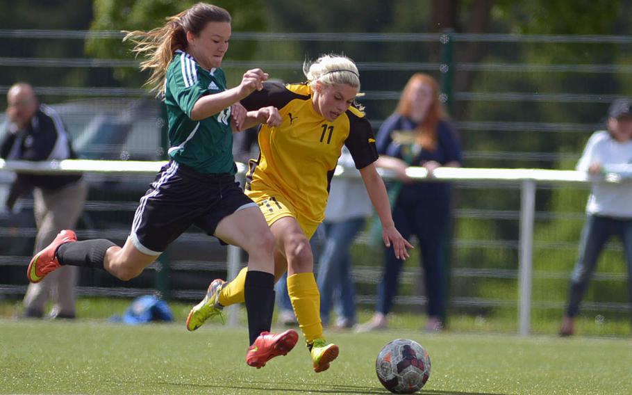Naples' Nora Bair, left, defends against Patch's Kaitlyn Farrar in a Division I semifinal at the DODEA-Europe soccer championships at Reichenbach, Germany in May 2015. Patch won the game 4-0.
