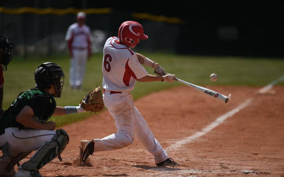 Kaiserslautern's Chris Lee hits a pop fly in a game against Naples at last season's DODEA-Europe baseball tournament.