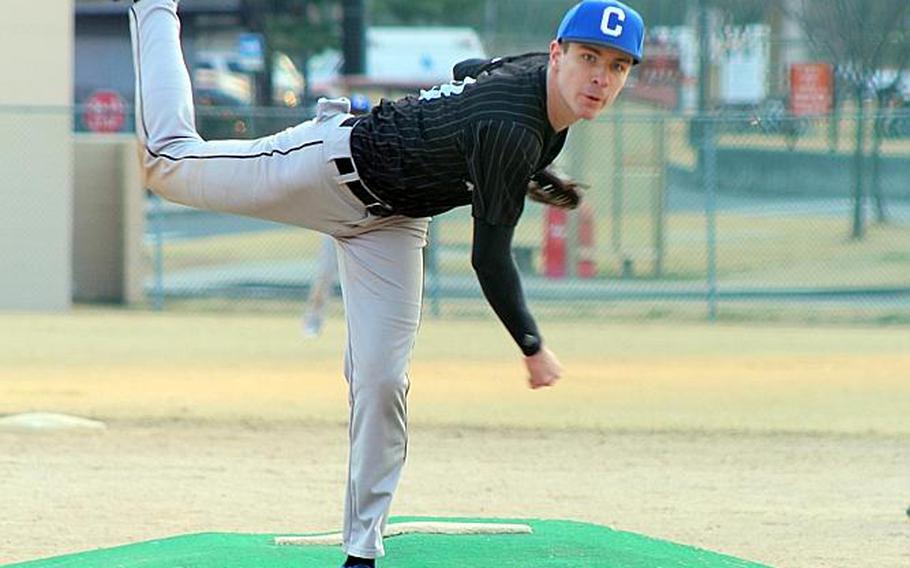 Osan senior Aaron Misner is one of two Cougars pitchers battling arm problems heading into the Far East Division II Tournament.