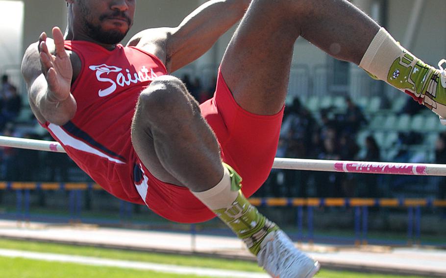 Aviano's Te'Kevin Boston clears 5 feet, 4 inches with a scissor kick to win the high jump competition in Aviano, April 30, 2016. He also won both hurdles events.