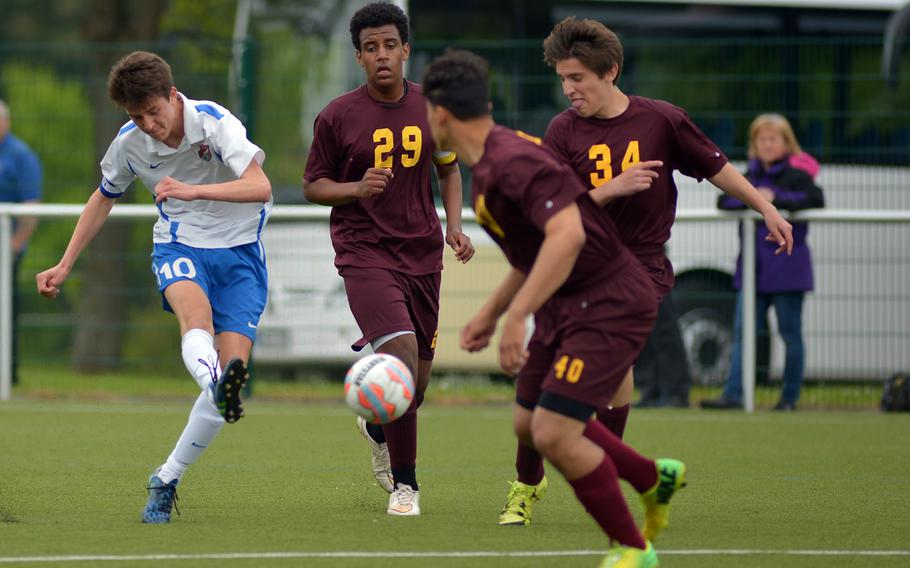 International School of Brussels' Matthieu L'Hostis gets off a shot against Vilseck in a Division I game at the DODEA-Europe soccer championships in Reichenbach-Steegen, Germany, Wednesday, May 18, 2016. L'Hostis has been selected a the Stars and Stripes boys soccer Athlete of the Year.