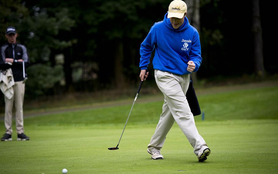Ramstein's Jonathan Ciero celebrates making a putt during the DODEA-Europe golf championship at Rheinblick golf course in Wiesbaden, Germany, on Thursday, Oct. 6, 2016.