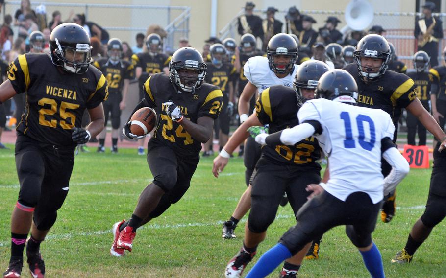 Vicenza sophomore running back Arthur McDonald heads upfield in the first half against Hohenfels on Friday, Sept. 30, 2016. McDonald rushed for 149 yards and three scores as the Cougars pulled away for a 31-3 victory.