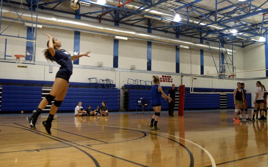 Sophomore volleyball player Maya Hagander serves the ball during a varsity practice at RAF Lakenheath, England, Sept. 29, 2016. She made the varsity squad as a freshman last year and is considered to be one of DODEA-Europe???s best young players.