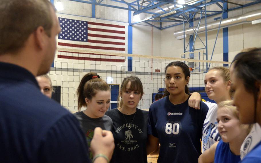 Number 80 Maya Hagander listens to guidance from varsity volleyball coach Dennis Ullery during a practice at RAF Lakenheath, England, Sept. 29, 2016. She made the varsity squad as a freshman last year and is considered to be one of DODEA-Europe???s best young players.