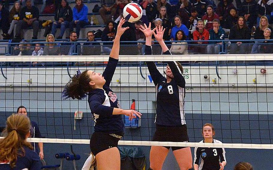 Bitburg's Elise Rasmussen, left, and Black Forest Academy's Jesse Campbell battle at the net in the Division II final at the DODEA-Europe volleyball championships in Kaiserslautern, Germany, Saturday, Nov. 5, 2016. Bitburg won 25-16, 25-15, 25-11 and Rasmussen was voted the DII tournament MVP.