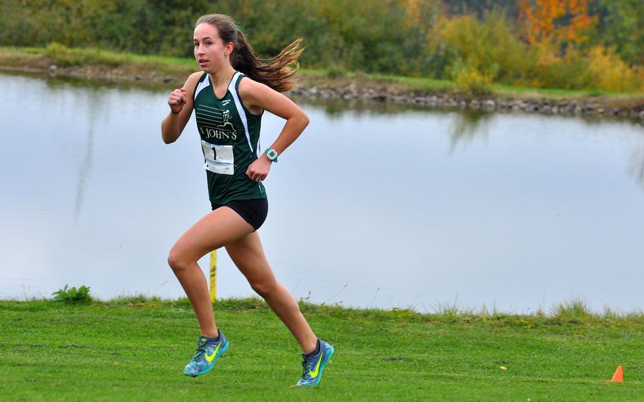 St. John's junior Kayla Smith won the girls' race on Saturday, Oct. 29  at the 2016 DODEA European cross country championships at Baumholder, Germany. Smith broke her own record on the course, set one year ago, with a time of 18:45.21. She has been named the girls cross country athelete of the year in Europe.