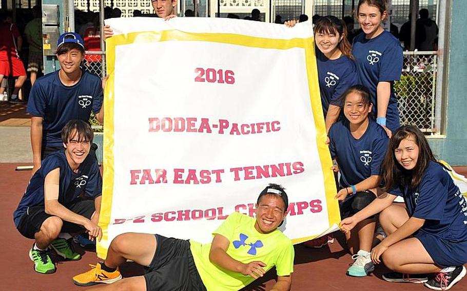 Christian Academy Japan captured the title as overall Far East tennis tournament Division II school champion. The Knights are: Honoka Miyata, Sara Means, Kaitlyn Corbett and Hanna Yozawa, and Tristin Mori, Kitt Mori, Kento Berry and Sean Overton.