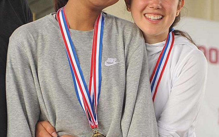 Matilde Piras, Seisen senior, right, and freshman teammate Sarah Omachi, are  Far East tennis tournament girls singles champion and runner-up and teamed up to win doubles.