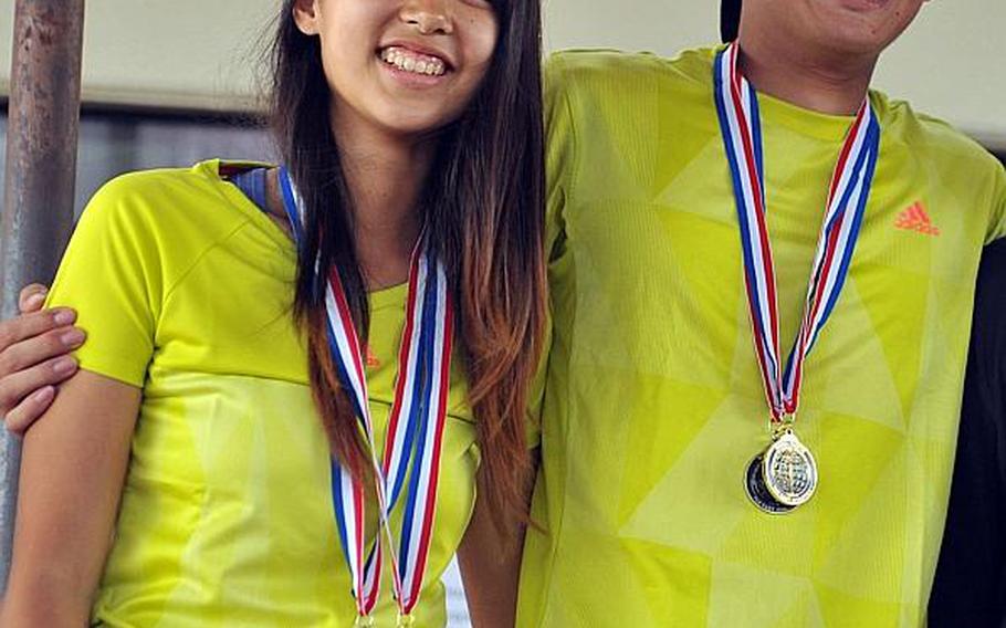 Eriya Hara and Ren Niikura of American School In Japan, Far East tennis tournament mixed doubles champions.