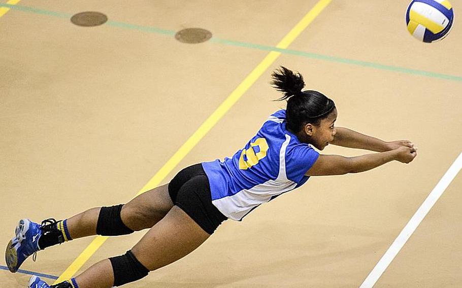 Yokota's Kyra Anderson lays out for the ball during the Far East Division II Volleyball championship match Thursday at Yokota Air Base, Japan. Anderson recorded five aces, seven digs and 25 assists en route to being named Most Valuable Player in the Panthers' 25-11, 25-23, 25-23 victory over the Knights.