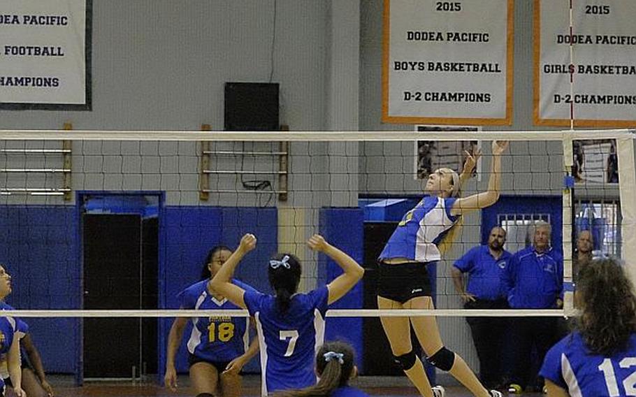 Yokota's Ashlyn Yevchak soars for a hit during the Far East Division II Volleyball championship match Thursday at Yokota Air Base, Japan. The Panthers defeated Christian Academy of Japan 25-11, 25-23, 25-23, claiming the school's first Far East volleyball crown.
