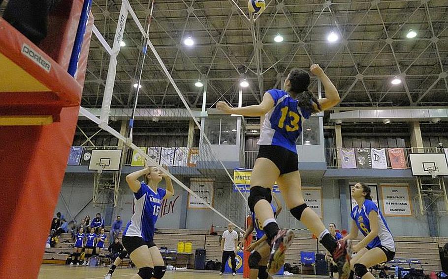 Yokota's Irene Diaz goes on the attack against the Christian Academy of Japan defense during the Far East Division II Volleyball championship match Thursday at Yokota Air Base, Japan. Diaz recorded seven kills and five digs in the Panthers 25-11, 25-23, 25-23 victory over the Knights.