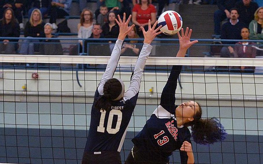 Bitburg's Elise Rasmussen, right, and Black Forest Academy's Erin Fortune battle at the net in the Division II final at the DODEA-Europe volleyball championships in Kaiserslautern, Germany, Saturday, Nov. 5, 2016. Bitburg won 25-16, 25-15, 25-11. Rasmussen has been selected as the volleyball Athlete of the Year for Europe.

Michael Abrams/Stars and Stripes