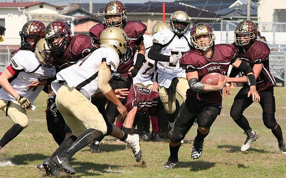 Matthew C. Perry senior running back Caeleb Ricafrente had a team-leading 875 yards on 118 carries, caught five passes for 99 yards and led the Pacific with 27 total touchdowns and helped the Samurai to their first Far East Division I football title, 44-6 over Humphreys. Ricafrente has been named Stars and Stripes' Pacific high school football Athlete of the Year.