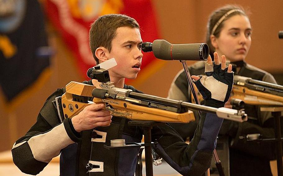 Callum Funk, one of Stuttgart?s best marksmen and the only male to make the top six, checks the placement of his shot during the 2016 DODEA-Europe marksmanship finals held in Vilseck, Germany, Saturday, Jan. 30, 2016.