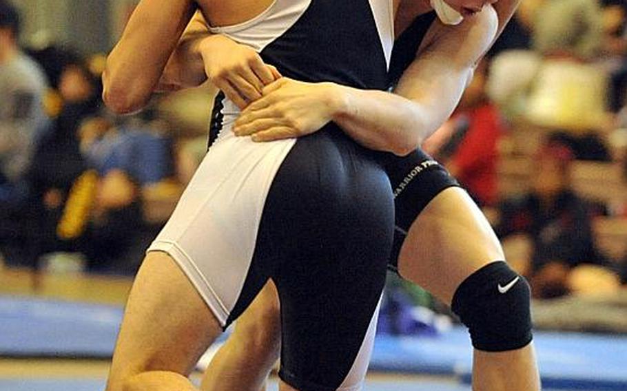 Hunter Lane, right, a Daegu 148-pounder shown wrestling Zama's Curtis Blunt in the "Beast of the Far East" title bout, said he was grateful for the opportunity to wrestle somebody besides the same ones he sees each week in Korea dual meets. He is one of just four on Daegu's roster.