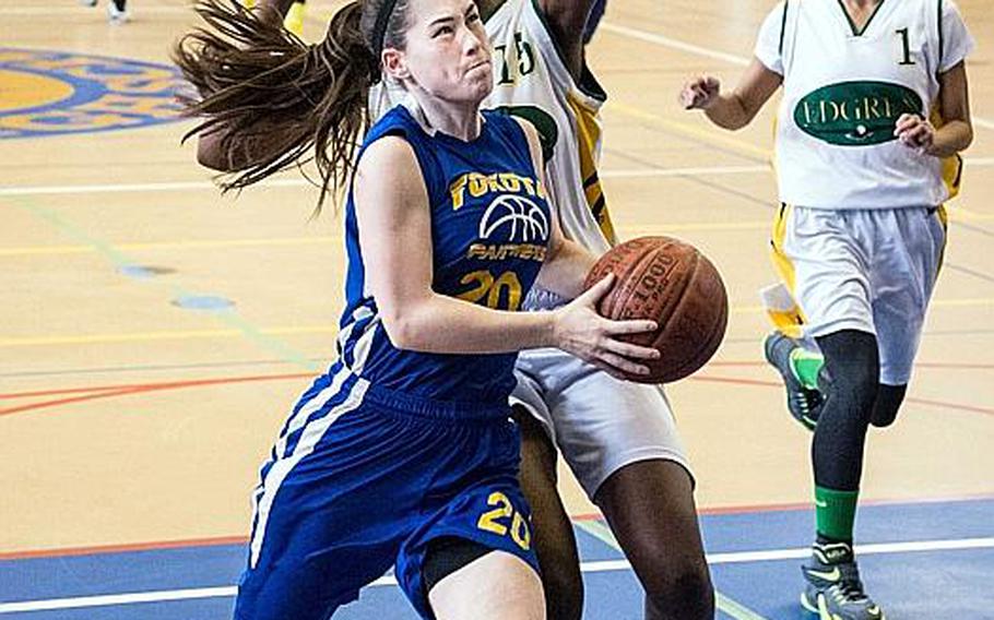 Sally Lambie is one of two players coach James Bailey hopes can take pressure off star center Britney Baily inside for two-time defending champion Yokota during Far East girls D-II basketball.