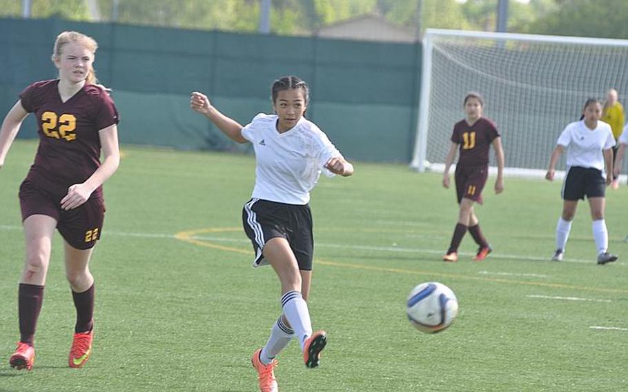 Vicenza freshman Cameron Cao takes one of her three shots on goal Friday - the only one that didn't go in  - in the Cougars' 2-0 victory over Vilseck.
