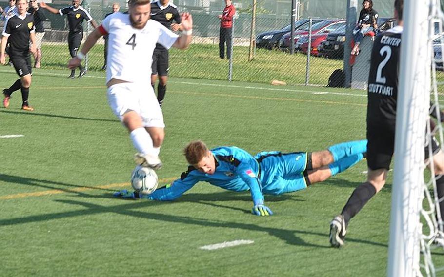 Naples' Matteo Pugliese tries to keep the ball in play while Stuttgart goalkeeper Evan Stuber sprawls to save it in the Wildcats' 2-1 victory on Friday.