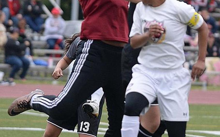 Zama goalkeeper Saige Rivers reaches for a save off a corner kick from Matthew C. Perry during Saturday's championship match in the DODEA-Japan girls soccer tournament. Perry outlasted Zama 4-0 for the first title in the tournament in school history.