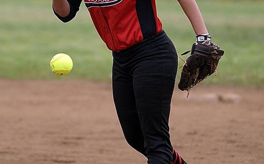 Nile C. Kinnick right-hander Mariah Wimberly delivers against E.J. King during Saturday's DODEA-Japan softball tournament championship game. The Red Devils won 18-6, rallying from a 6-2 second-inning deficit.