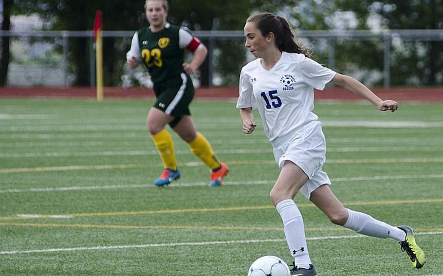 Wiesbaden forward Erin Goodman runs with the ball in the first half of a match against SHAPE Saturday, April 22, 2017, in Wiesbaden, Germany. Goodman and the Warriors won the match 2-0 with a pair of second-half goals.