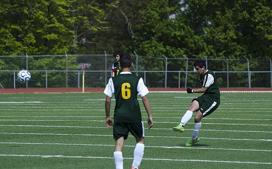 SHAPE's Roberto Llano attempts a free kick in the second half of a match against Wiesbaden Saturday, April 22, 2017, in Wiesbaden, Germany. Llano scored the Spartans' second goal in a hard-fought match.