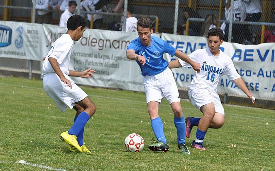 Marymount's Julian Van Heusbengen splits a pair of Rota defenders to move the  ball forward in the Admirals' 5-3 victory Saturday.