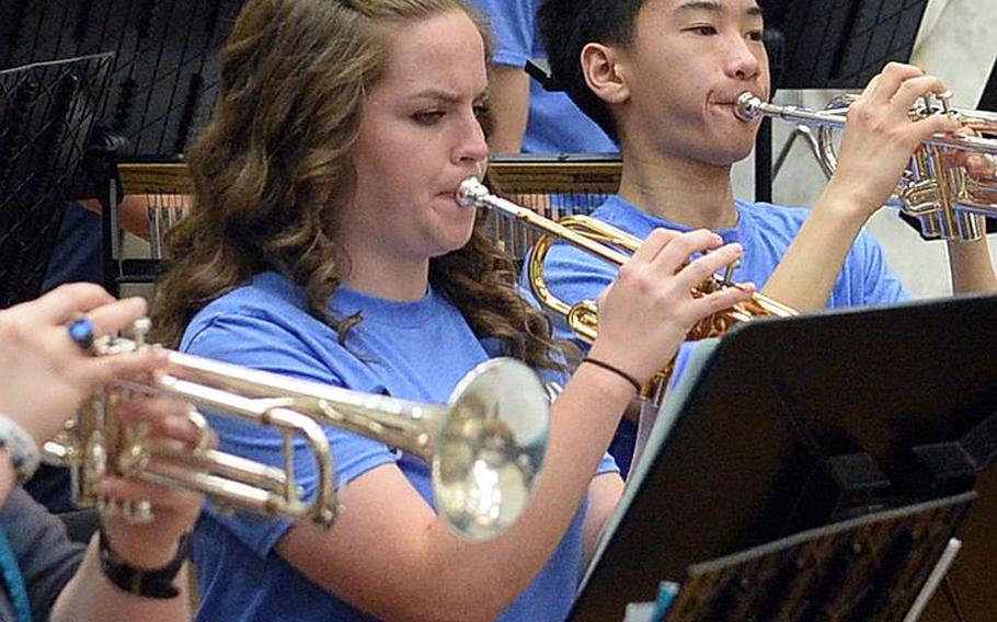 Seoul American senior defensive captain Sierra Furner doubles as a trumpet player for the school's band and was one of 147 student-musicians selected for the Far East honors music festival. She was one of five Falcons players, two of them starters, who opted for music instead of soccer this week.