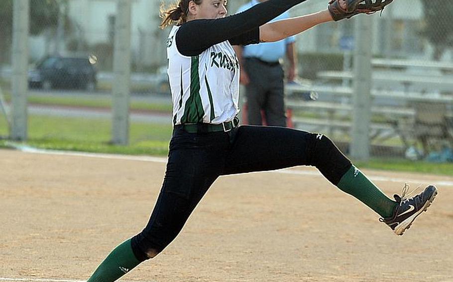 Kubasaki senior pitcher Reaven East kicks and delivers against Kadena during Friday's Game 2 of the Okinawa district softball finals, won by the Dragons 8-4 to complete a two-game sweep.